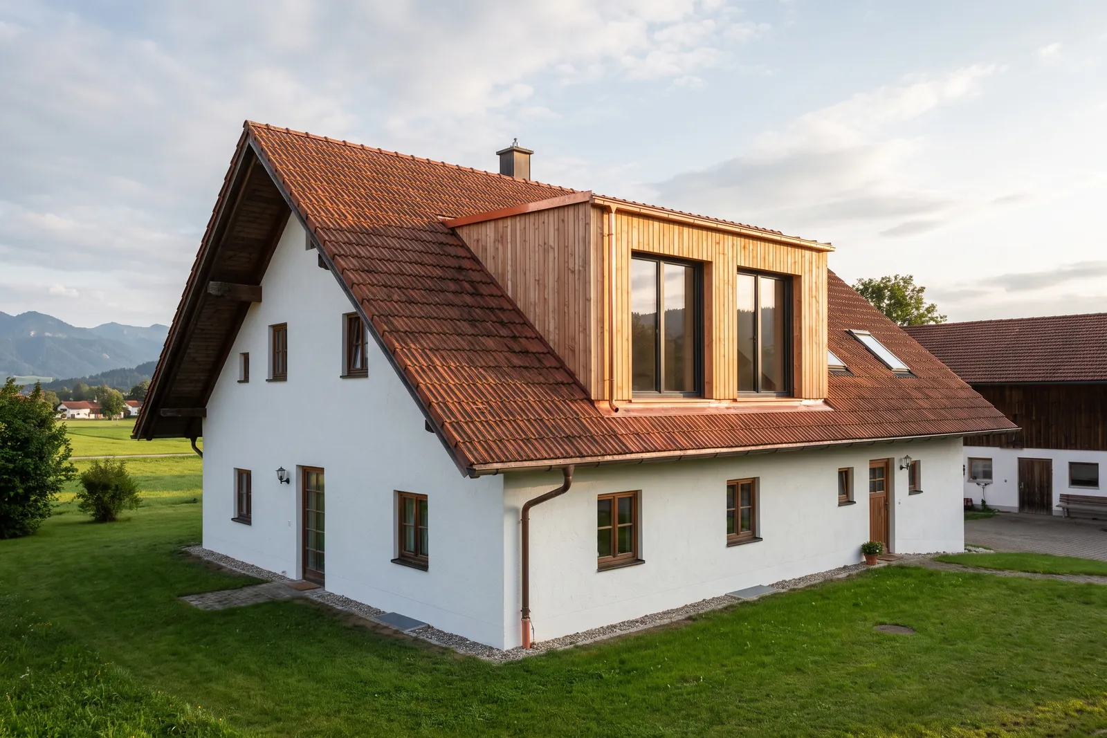 Haus mit neuer Schleppgaube aus Lärchenholz